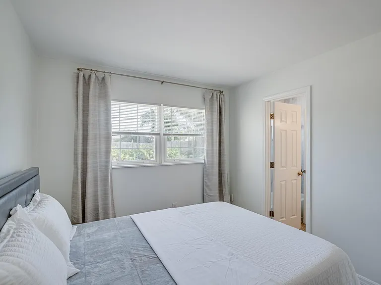 Furnished bedroom #1 with access to completely remodeled Jack & Jill bath