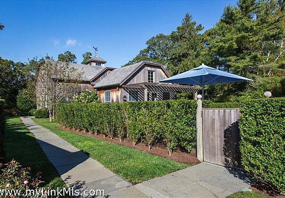 View of guest house and pool entrance