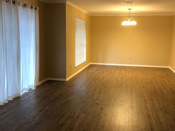 Large living/dining room. Could be an office or spare bedroom.