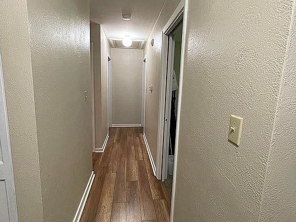 Hallway to bedrooms and bath