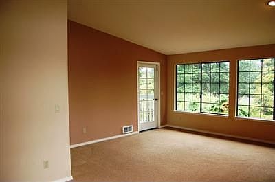 Living Room - Top Floor w/Light, Privacy, and Vaulted Ceilings