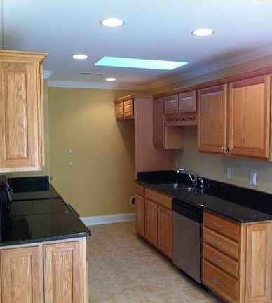 Kitchen w/ granite tops