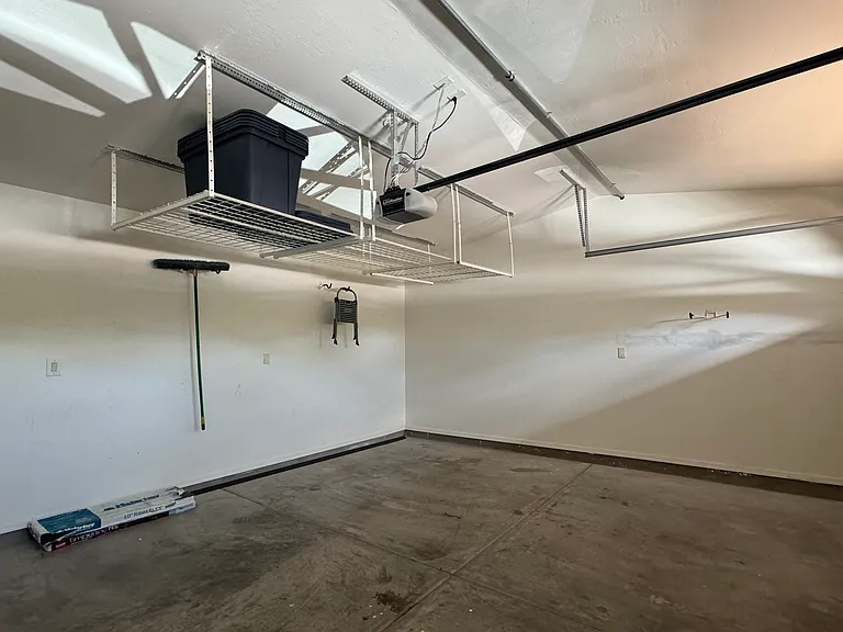 FURNISHED. Two-car garage with lots of storage room.