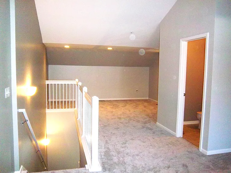 Fourth floor loft with half bath.