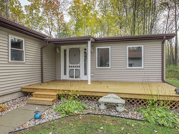  The inviting back porch deck is the perfect spot to rest, relax and enjoy the natural views.