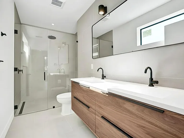 Stunning huge master bathroom with steam shower and double sinks. Immense storage for all the beauty supplies and skincare.