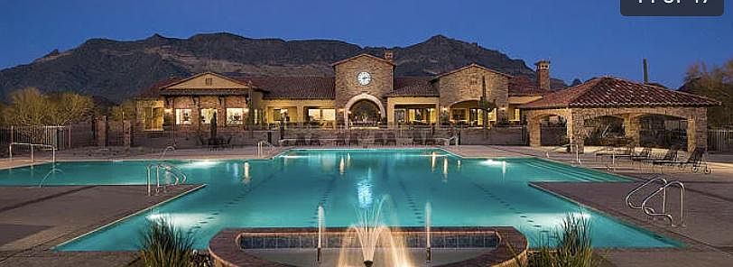 Community Heated pool and Hot tub showing the club house in back ground and behind that the beautiful Usery Mountain skyline. Great pool to relax in year round in AZ.
