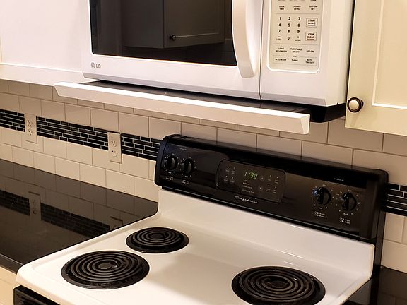 Pull out exhaust hood over stove.