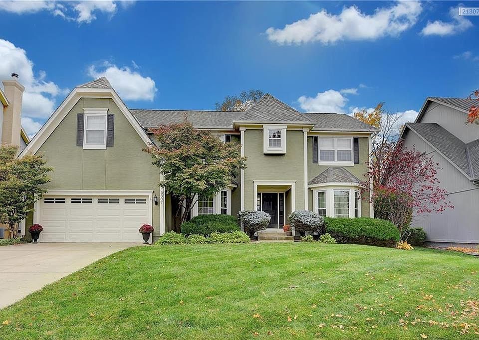 Welcome home to this charming 2 story home in Blue Valley North School district.