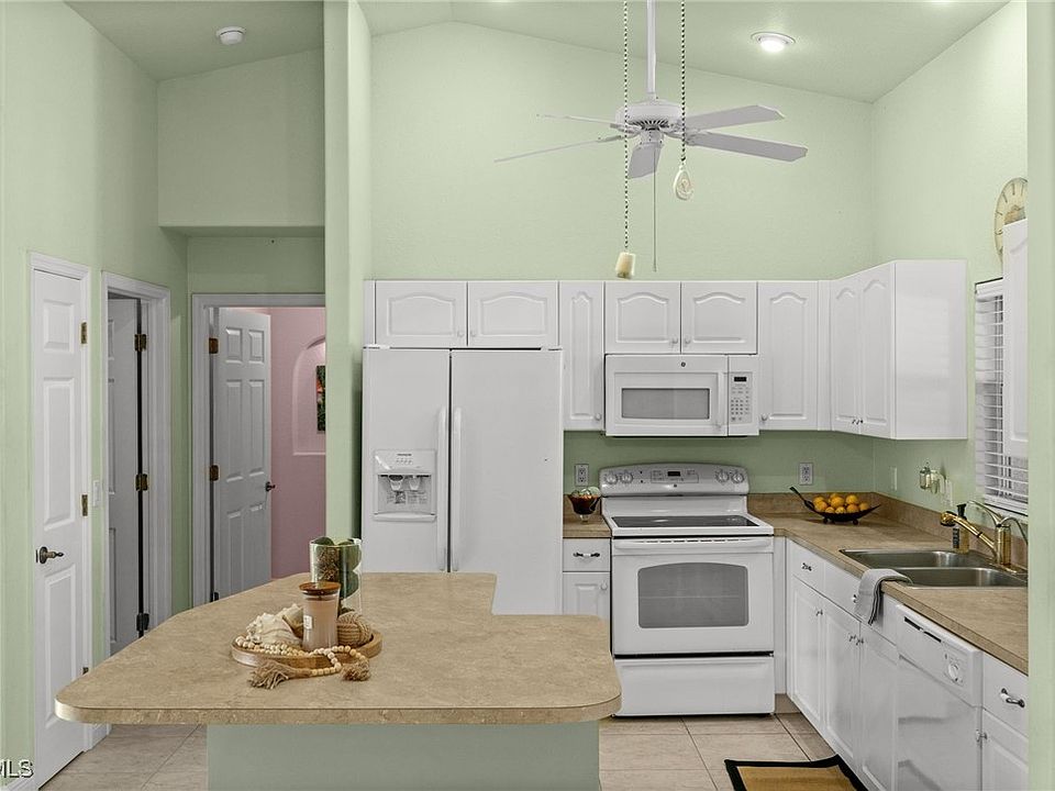 1st image of 221 NE 14th Terrace Cpe