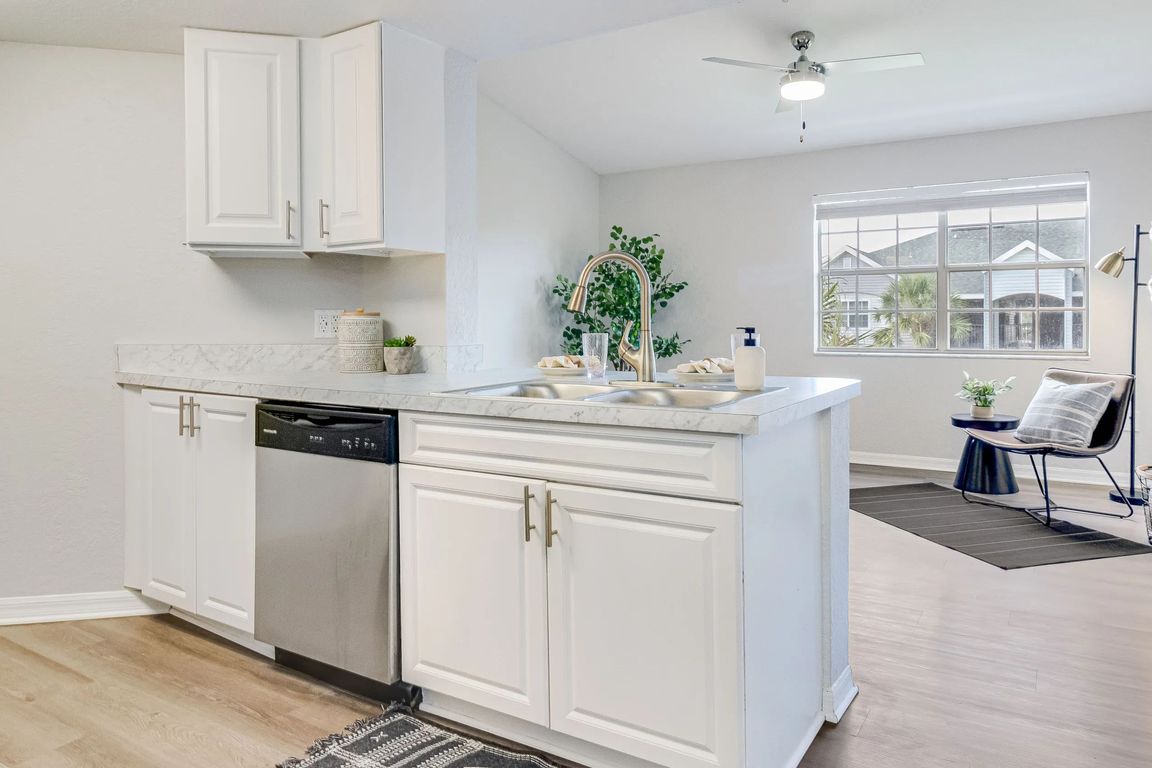 Delight in the beautiful open kitchen design with a breakfast bar, fostering a harmonious connection between culinary artistry and relaxed living.