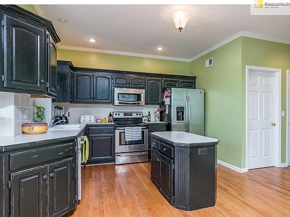 Kitchen features stainless steel appliances