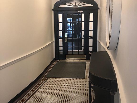 interior hall, security cameras and mirror to do that last look before heading out the door!