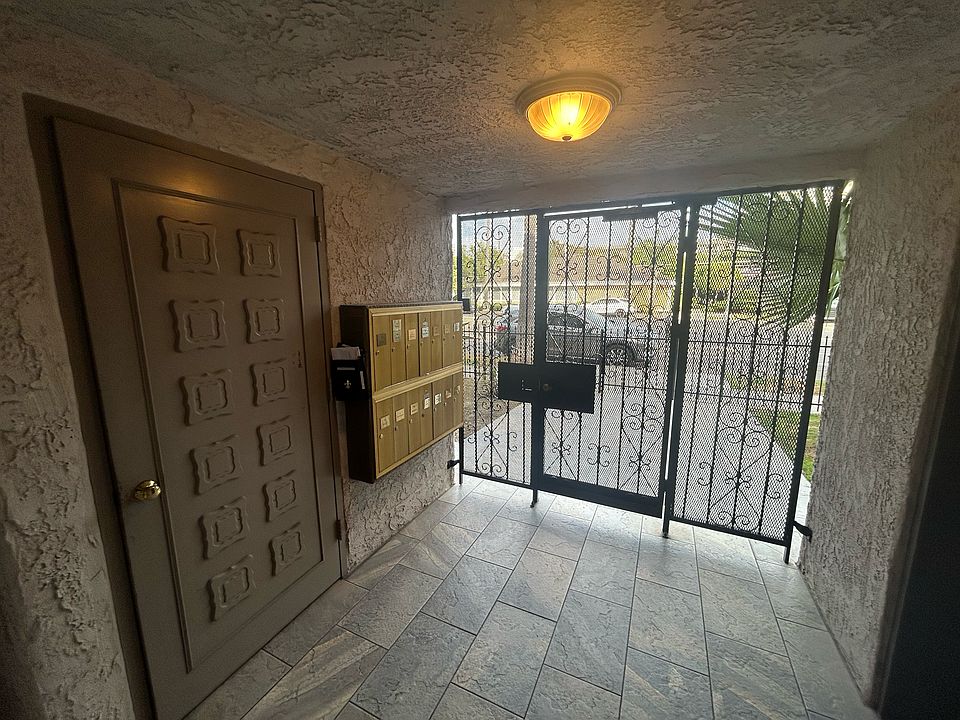 building lobby. mailboxes pictured on left