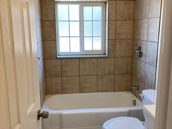 We re-tiled the shower surround in February 2021 and replaced the shower head and handle.