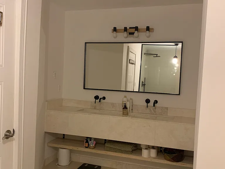 Bathroom on second floor.
Entire bathroom made of marble.
Walk-in shower with a single frameless glass door.