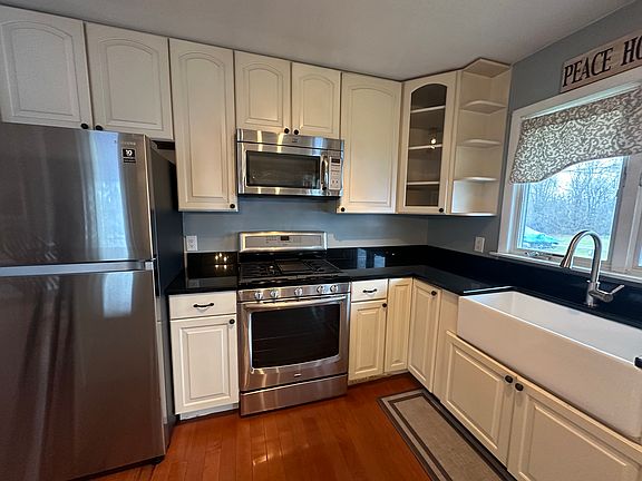 Kitchen, all stainless steel appliances and deep sink