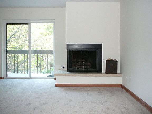 Living room: Fireplace, balcony
