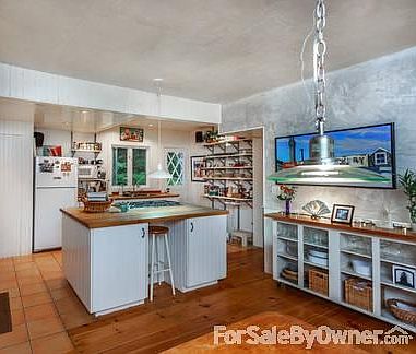 Kitchen
						:
						Convection oven, professional Thermador stove, butcher block island, tile floor