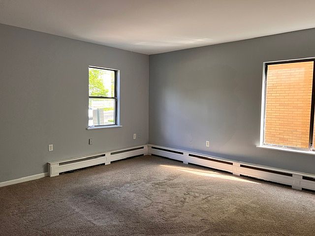 Bright first-floor living room with generous natural light.
