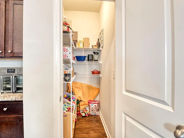 Second pantry/storage closet.