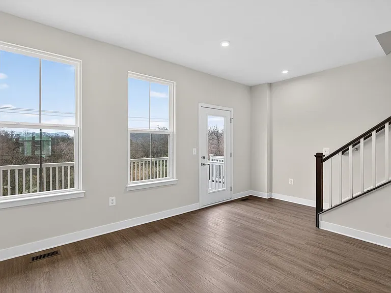 Dining area on 2nd floor overlooking back deck, LVP flooring