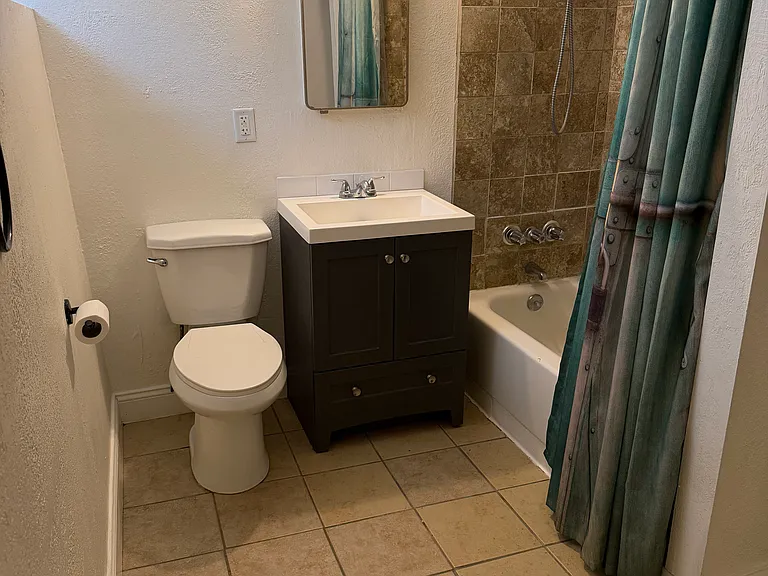 Full bath, plenty of room for some storage furniture.