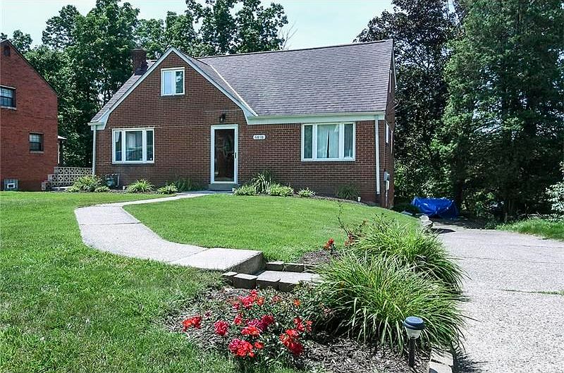 Front Exterior: This 3 bed, 2.5 bath has great curb appeal! Level entry, concrete sidewalk and long concrete driveway to parking pad and rear entry, one car, integral garage. Walk two blocks to South Park! Minutes from South Park Golf Course, shopping and