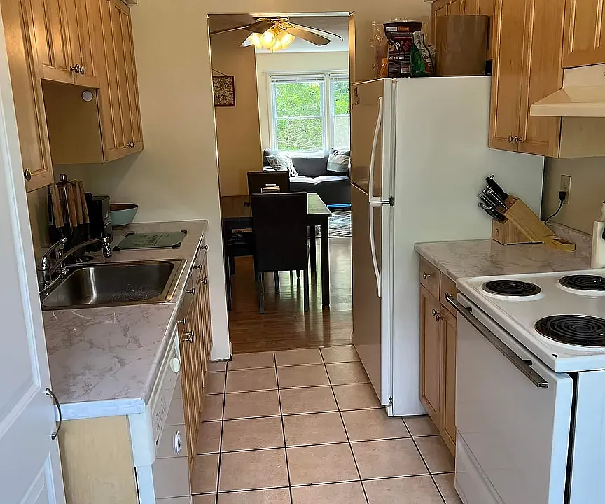 Updated kitchen with soft close drawers. Room for a breakfast table near the window or additional cabinets, storage or prep areas.
