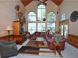 Dramatic Ceilings And Two Story Window Wall Draw You Into This Spacious Living Room. Plenty Of Room 