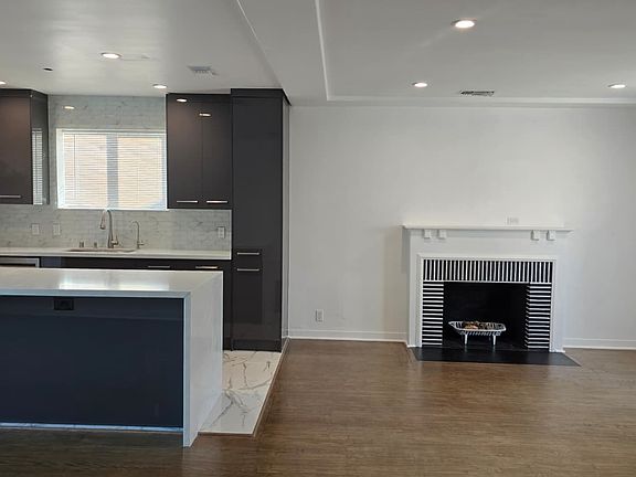 fireplace and kitchen in the living room