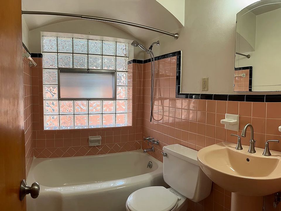 Bathroom with shower wand, linen closet and medicine cabinet