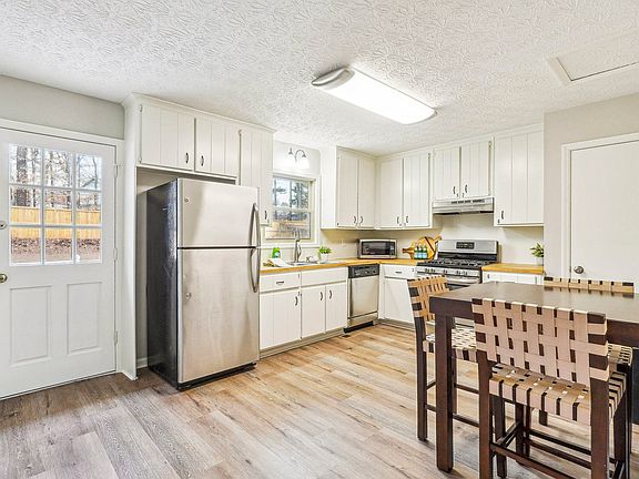 Kitchen with stainless appliances and lots of storage.