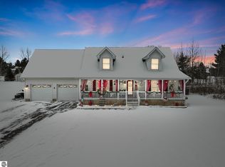 9288 Windsong Ln, Cadillac, MI 49601