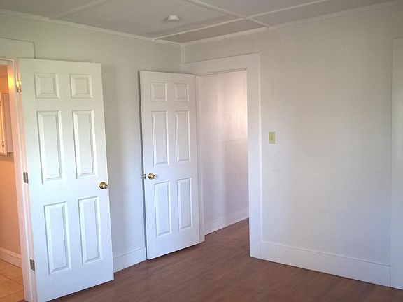 master bed and bath with full sized tub