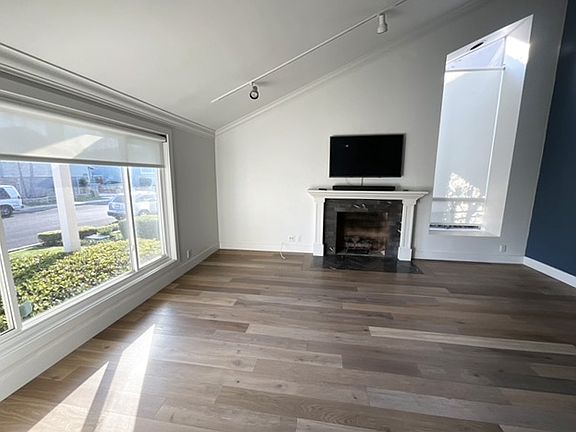 Living Room with an array of natural light through two large windows~