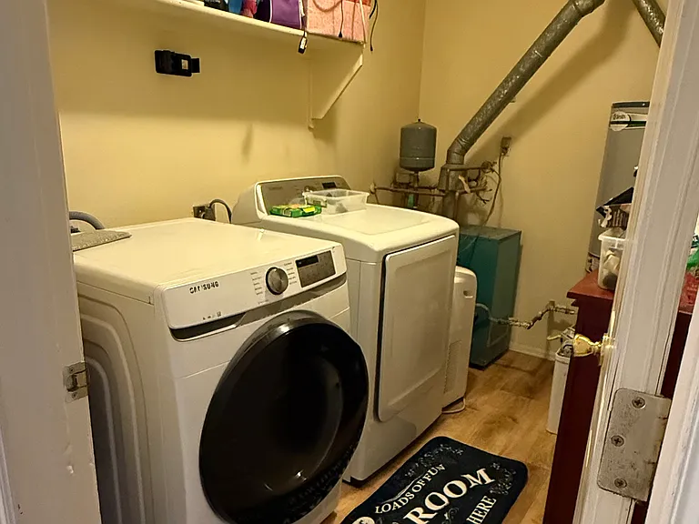Main Floor:
Laundry Room with HOOK UPS ONLY.