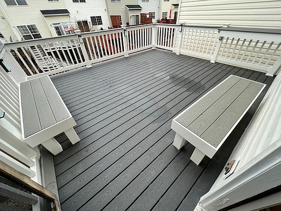 deck with Solar lights and privacy wall