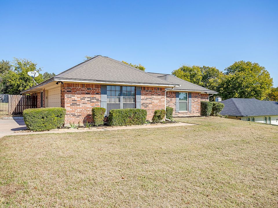 Side-Entry, 2-car garage, large driveway for ample parking.