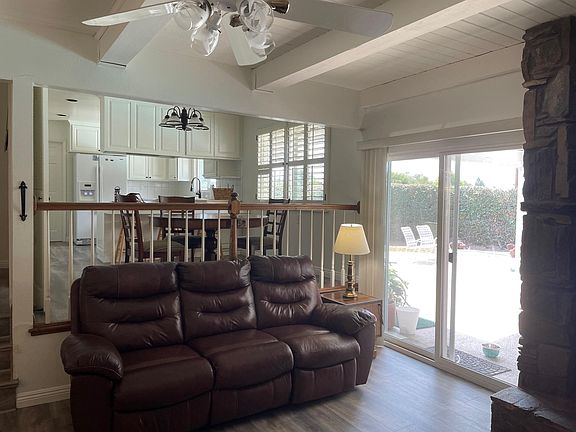 Sofa, fireplace, new floors throughout