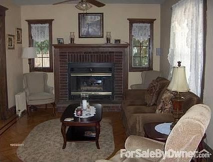 Living Room : Gas fireplace and natural chestnut trim