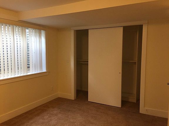 Master bedroom features attached bathroom and large closet. Oversized window brings in plenty of natural light.