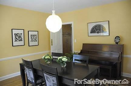 Dining room with swinging door to kitchen.