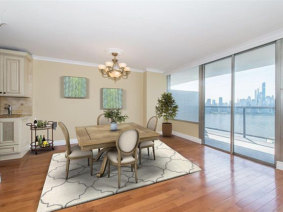 5th image of 6050 Blvd E APT 14J