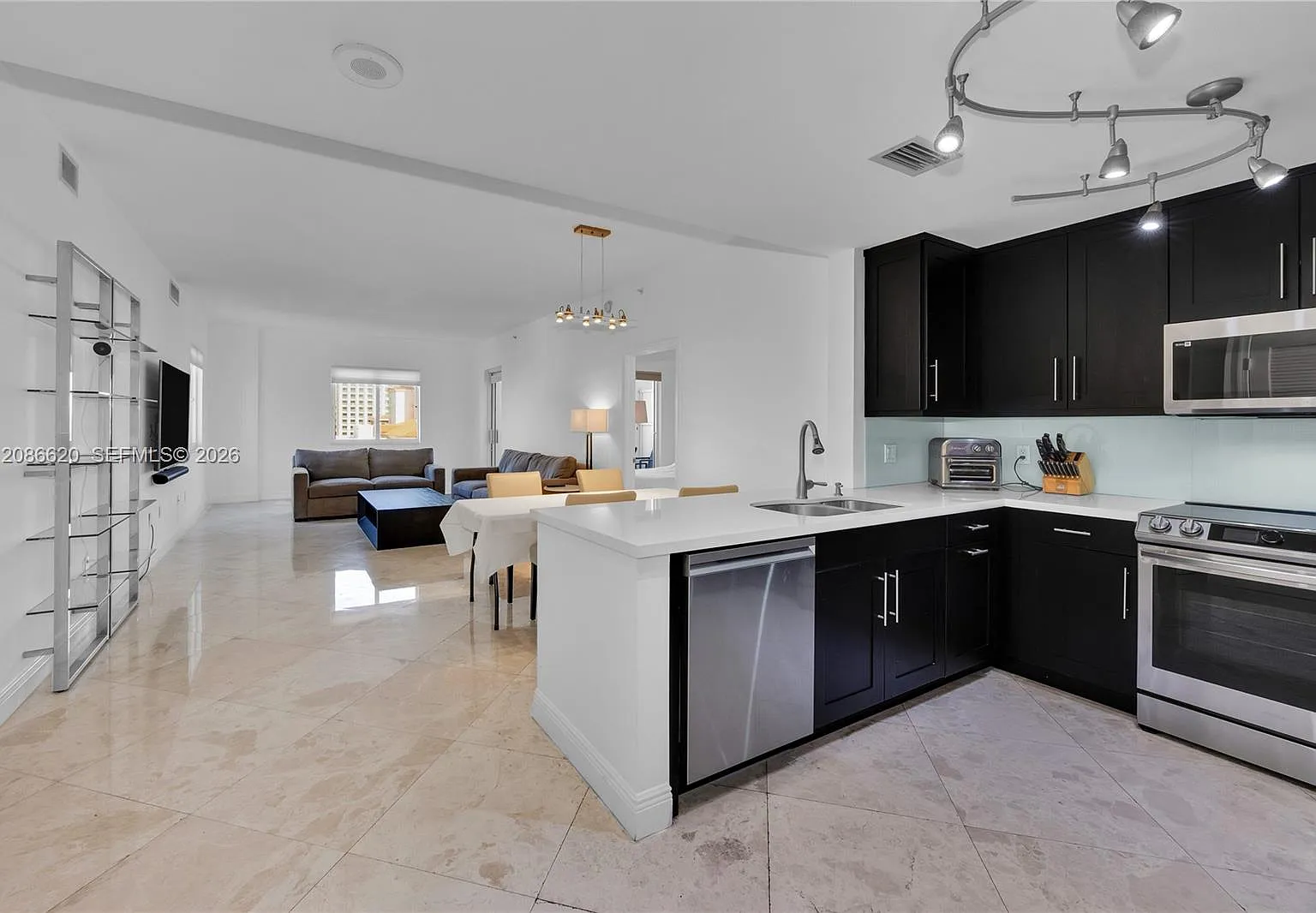 Ten Aragon Condo — Photo 2