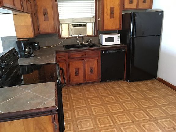 Kitchen includes microwave and dishwasher