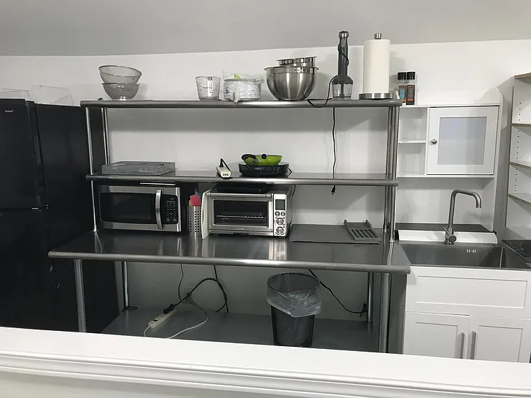 Food prep area. full size refrigerator, induction hot plate, induction cookware, microwave, and Countertop Toaster/Oven/Air Fry (Bake Broil Roast, 6 Slice Large Capacity).