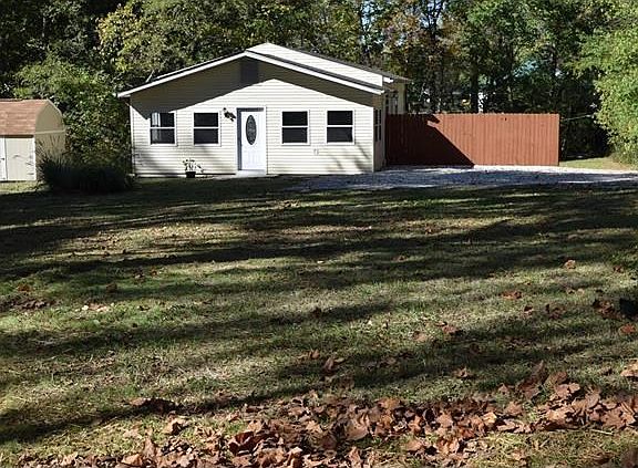 Large front yard in relation to street.