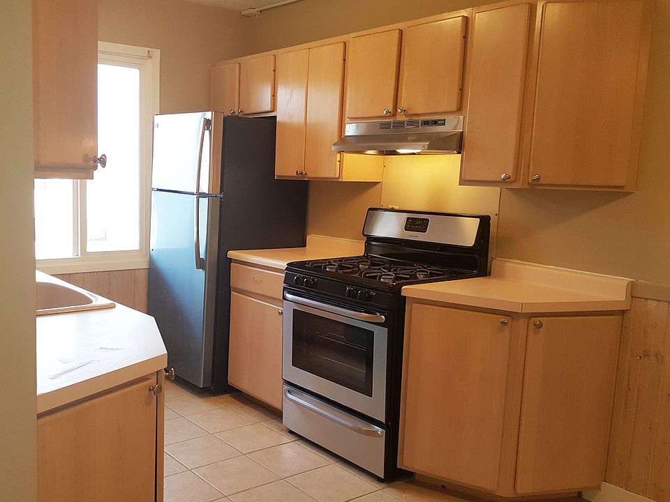 New stainless appliances and tile floors.