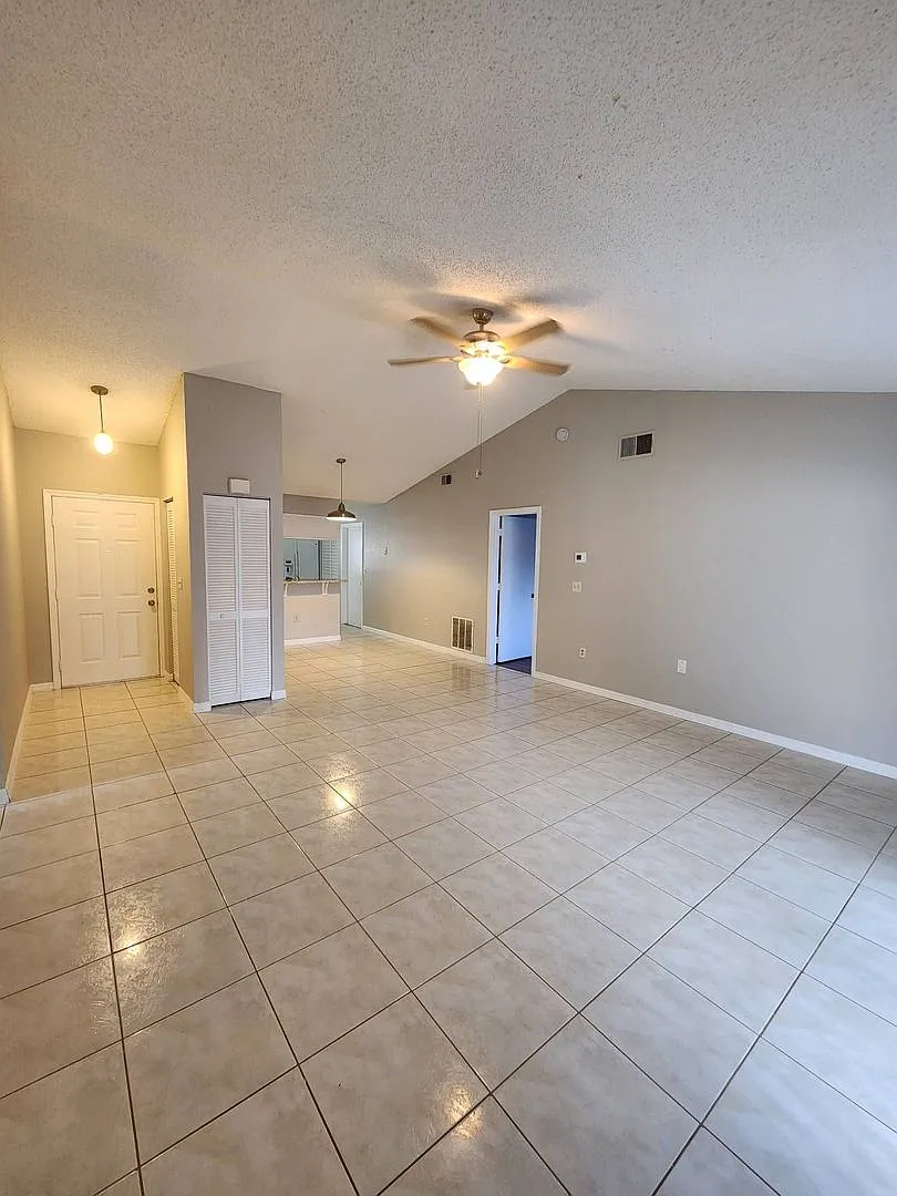 Move-In Ready Poinciana Gem with a Brand-New Kitchen & Screened Porch! — Photo 3